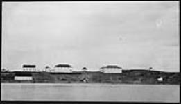 J.F.M. Hudson's Bay buildings, Chipewyan, Alberta 1930.