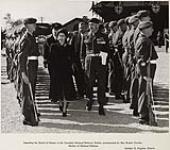 Princess Elizabeth inspecting the Guard of Honour at the Canadian National Railways Station, accompanied by Honourable Brooke Claxton, Minister of National Defence - Kingston, Ontario October 12, 1951.