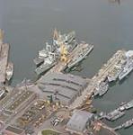 HMCS Protecteur and HMCS Provider side by side at "C" Jetty in dockyard, Victoria, British Columbia November 17, 1992.