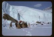 No. 18 - Men and J-5 at toe of Gilman Glacier 1957-1958.