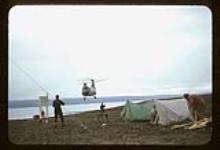 No. 21 - U.S. Army helicopter and tents 1957-1958.