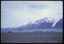 CCGS John A. Macdonald, Tanquary Fiord - Men and helicopter at Tanquary Fiord August 20, 1962.