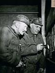 Coal mining, Mitchell, British Columbia - Miner Charlie Koska and Albert Ciamolini May 1943.