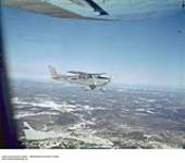 New Cessna 182 Army Aircraft in Air ca. 1943-1965.