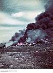 Bombs Set Fire Near Command Post in France ca. 1943-1965.