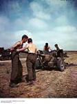 Cleaning 6 Pounder Anti-Tank Gun in France ca. 1943-1965.