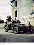 Belgians and Canadians in Armoured Car at Sallenelles, France ca. 1943-1965.