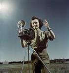 Sgt. Karen Hermiston with Speed Graphic Camera ca. 1943-1965.