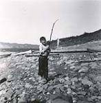 [Boy with fish and pole] [between 1928-1950].