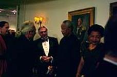 [National Chief Phil Fontaine greets Governor General Roméo LeBlanc and Nelson Mandela] [September 1998].