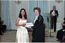 [Reporter Prithi Yelata accepts a 1999 Michener Citation of Merit award from Governor General Adrienne Clarkson on behalf of The Record] April 10, 2000.