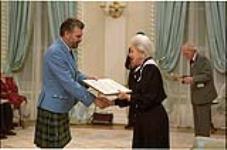 [Publisher Jim MacNeill receives the 1987 Michener Honourable Mention award from Governor General Jeanne Sauvé on behalf of The Eastern Graphic] December 8, 1988.