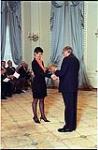 [CBC producer Michelle Metivier accepts the 1996 Michener Citation of Merit from Governor General Romeo LeBlanc on behalf of the Fifth Estate] May 1, 1997.