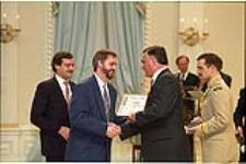 [André Picard, representing the Globe and Mail, accepts the 1993 Michener Award from Ramon Hnatyshyn, Governor General of Canada] May 9, 1994.