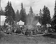 Tonquin Valley - alpinists around camp fire 1926