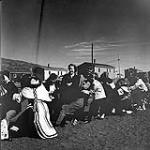 [Women playing tug o' war, Iqaluit, Nunavut] 1960