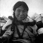 [Kenojuak Ashevak sitting in a tent, Kinngait, Nunavut] 1960