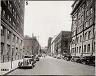 Looking north on O'Connor from just south of Queen; Hunter building on left, June 14, 1938 June 14, 1938.