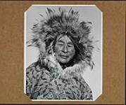 Older woman from near Cambridge day. Her wolverine trimming is white with frost, the wolf fur even more so 1949