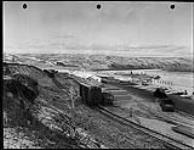 Railroad spur and warehouse at Brechtel-Price-Callahan Base Camp Peace River November 18 1942.
