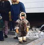 Child wearing fur suit, Arviat 1979.