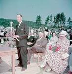 Hon. Robert H. Winters, Minister of Resources and Development, delivers the official opening address at ceremonies marking the opening of Fundy National Park July 1950