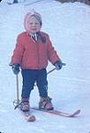 Portrait of child female skier Merge Wheeler Vaughan. Midget Skiing (probably Camp Fortune) February, 1964
