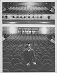 Homme debout dans un théâtre vide [ca 1955-1976].