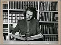 Marie Ballard studying law in the student's library at Osgoode Hall, Toronto, Ontario n.d.