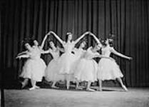 Seven female performers dance in Boris Volkoff's Canadian Ballet production of "Sur les Pointes." March, 1946