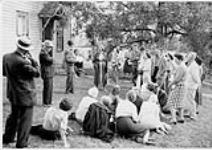 Wilson P. MacDonald reading to group in Cheapside, Ontario September 18, 1960