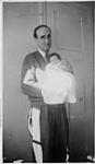 Wilson P. MacDonald holding Ann MacDonald 1939