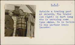 [Kurt Lang carrying Lynx skins and his trading partner Ernie Lacombe] [between 1955-1963]