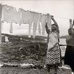 [Two Inuit women hanging clothes to dry] [between 1955-1963]