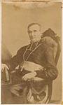 Portrait of a seated priest [ca. 1875-1910]