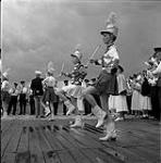 Majorettes performing during the Swan River round-up, Manitoba June 30, 1956.