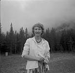 Woman smiling, Ghost River, Alberta ca. 1962.