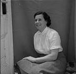 Woman Sitting Inside, H.B.C. Trail, British Columbia July 1, 1955