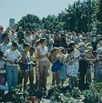 Children awaiting Queen Elizabeth and Prince Philip's arrival at Hamilton, Ont.  July 1959
