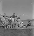 Captain of the clouds, group at waters edge. North Bay, Ontario August, 1941