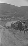 Gaspé 1951, (D) group walking down the road 1951