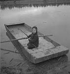 Jack Miner, bernaches, enfant dans une barque [between 1939-1951].
