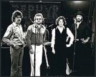 Le groupe Canadian Zephyr sur scène. De gauche à droite : John Howard, John Hayman, Tom Graham, Garth Bourne [entre 1973-1983]