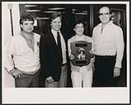 De gauche à droite : Gregory Donaghey (Carlton Showband), Pat Power (Newfoundland Cultural Society), Lori Young et Marty Hibbs (Newfoundland Cultural Society) [between 1980-1985].