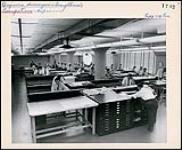 Engineers working at one Canada's large engineering firms. Occupations - Professional Engineers Photo: Canada Pictures Ltd. Department of Citizenship and Immigration, Information Division [entre 1930-1960]