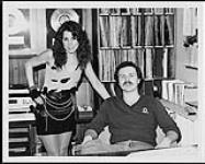 Portrait of Lee Aaron and CFOX FM radio's Rich Shannon. She visited the station to promote her album Metal Queen. Vancouver [ca 1984]