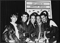 Portrait of the band The Box holding their awards at the 20th Annual Procan Awards [ca 1984].