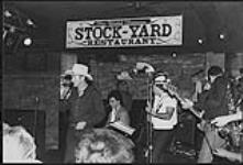 Johnny Burke performing live at the Stockyard's Bull Pen Lounge in Nashville, TN. Earlier, he had showcased his first U.S. single release called Still Feels Good [ca 1985]
