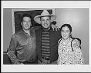 Portrait of Vito Lerulo (?), Garth Brooks, and an unidentified young girl [ca. 1995]