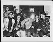 Portrait of the group The Bongos a a party in celebration of the Rolling Stone Review release at NYC's Limelight. L to R: Bongo James Mastro, Talking Heads percussionist Steve Scales (who joined The Bongos on tour in 1985), and Bongo members Frand Giannini and Richard Barone. RCA News mars 1985